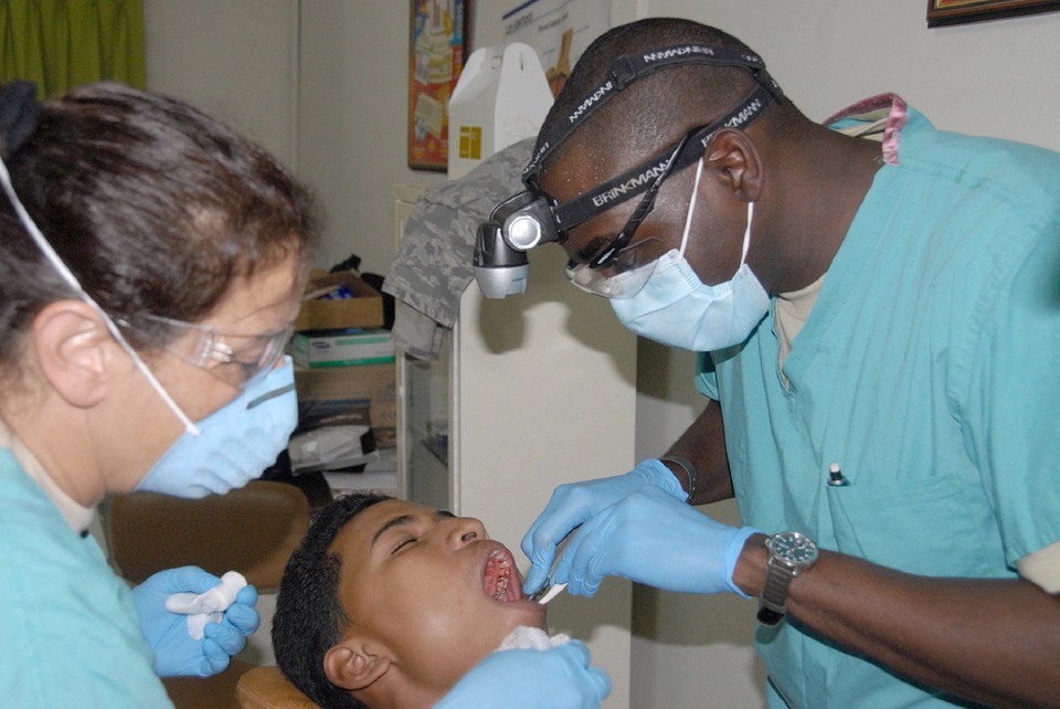 dentist and patient in dental clinic